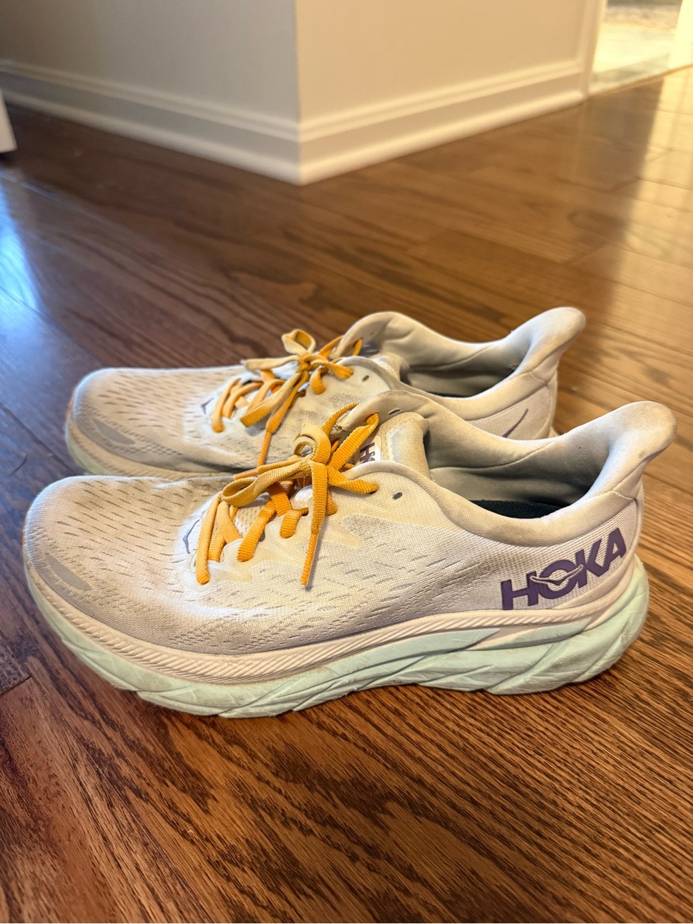 Hoka Kids White Sneakers with Mint Soles and Yellow Laces